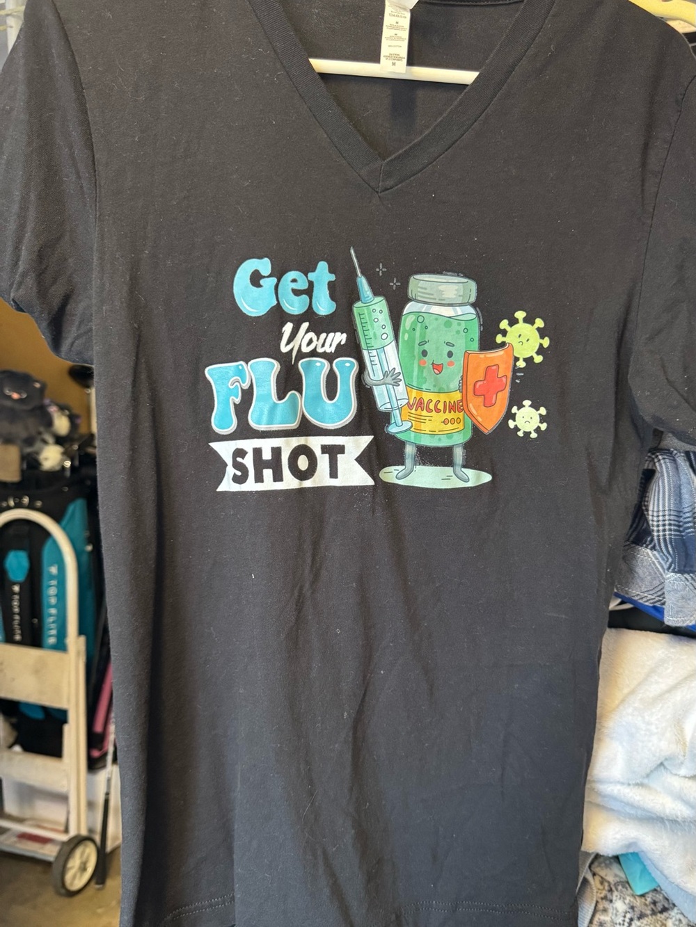 V-Neck Tee with Blue and Green Vaccine Graphic. NOT FADED black